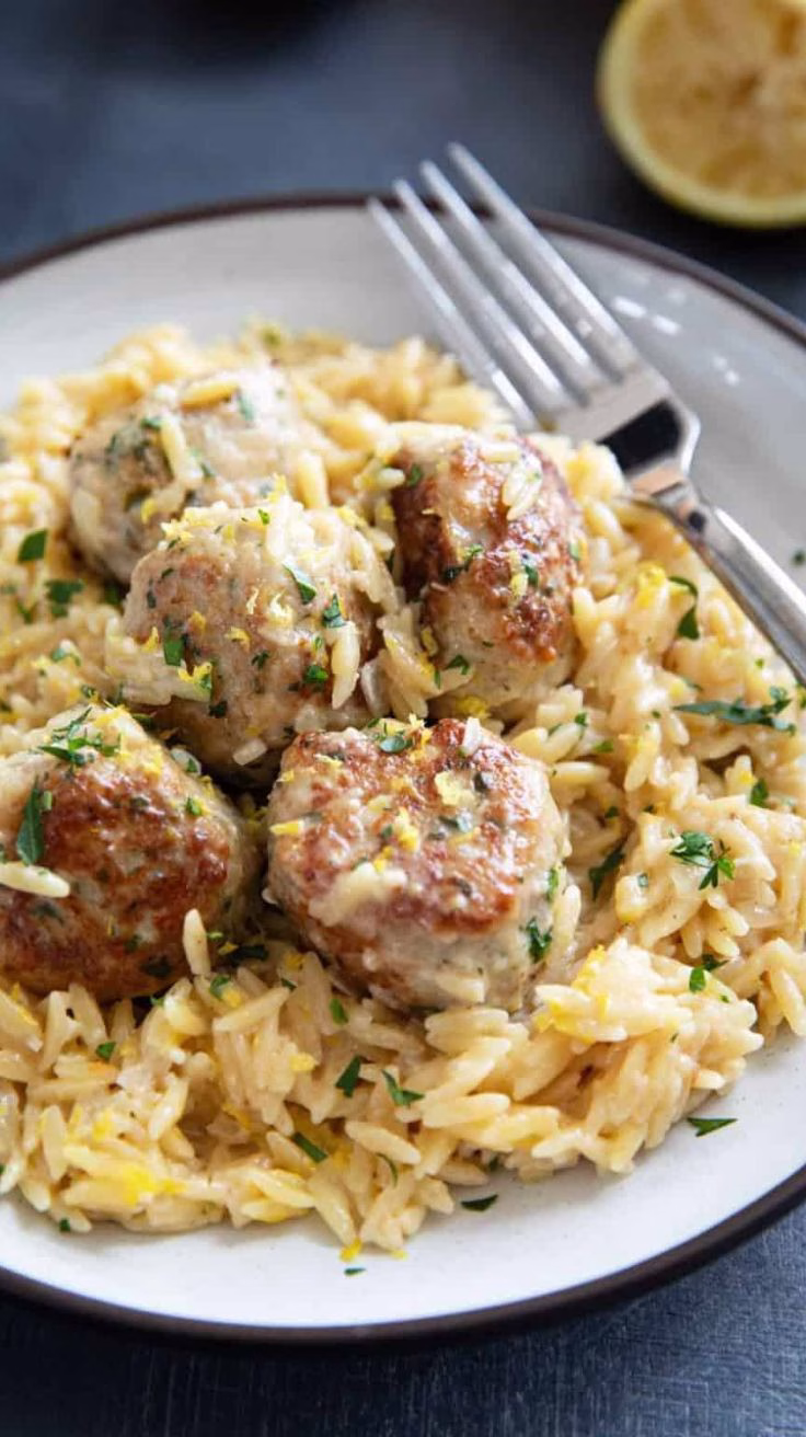 crockpot garlic butter chicken meatballs with creamy orzo