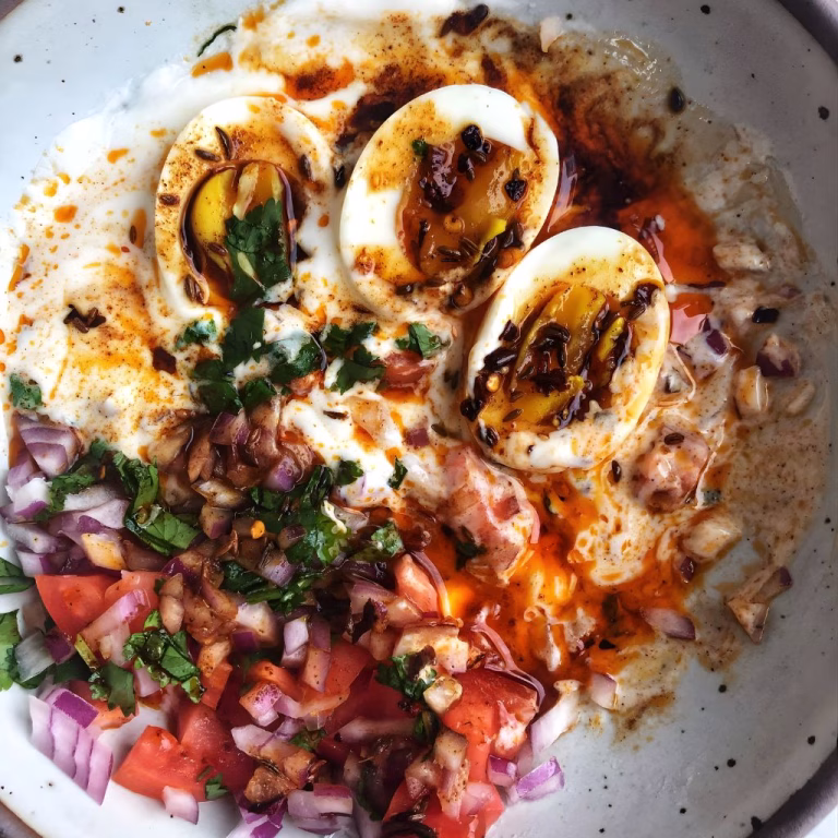 Poached Eggs with Yogurt, Tomato, Onion & Cumin Chili Oil Recipe