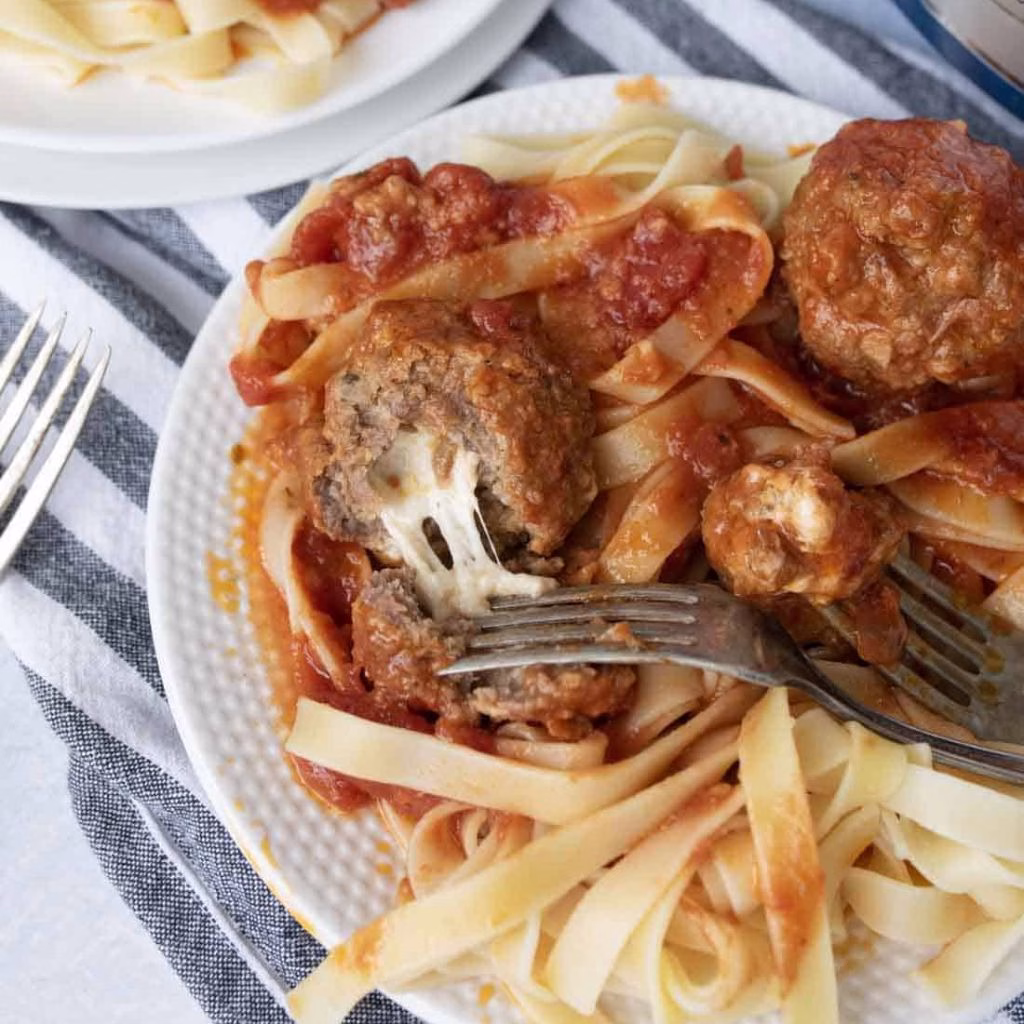 Slow Cooker Mozzarella Stuffed Meatballs
