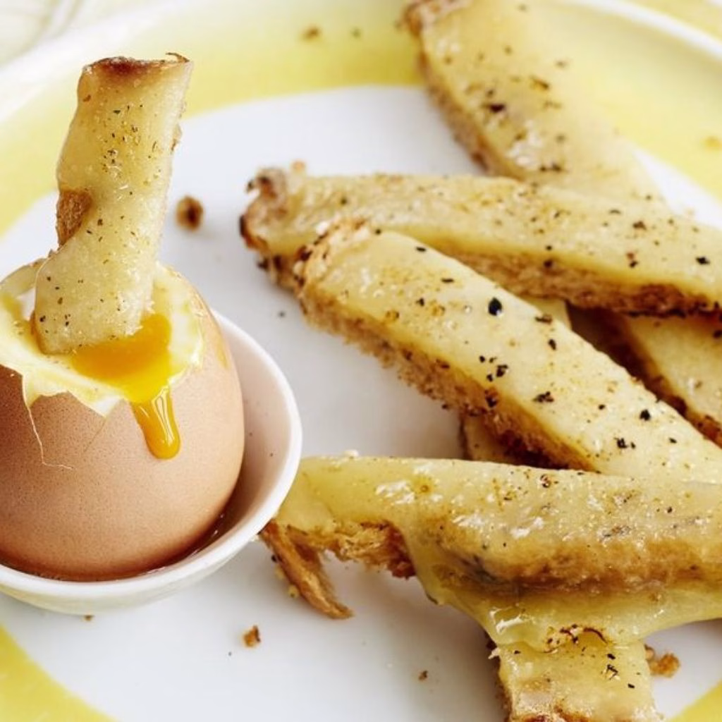 Cheesy Scrambled Eggs with Toast Soldiers