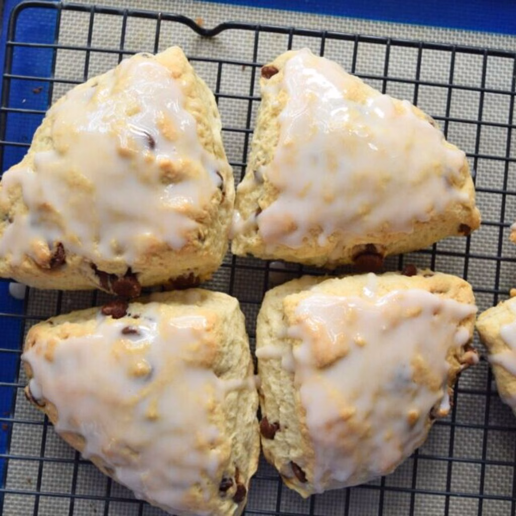 Glazed Chocolate Chip Scones with Vanilla Drizzle